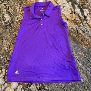 Girls golf tee shirt. Brand Adidas. Color purple. Size small.